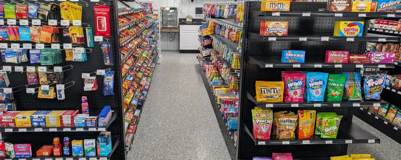 Bright, clean aisles stocked with snacks and essentials