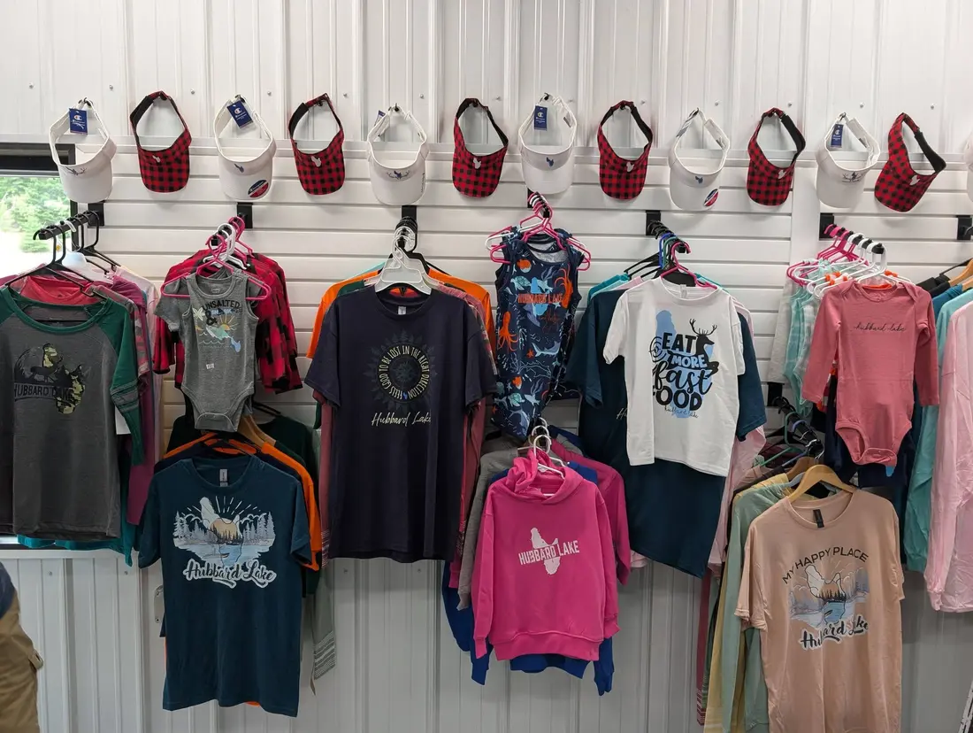 Display of Hubbard Lake shirts and hats